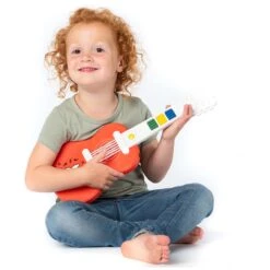 Nijntje Speelgoedinstrument - Mijn Eerste Gitaar Orange -Prenatal 1518230079 4 7C73A2CCBFB2F4226E5542F8F65A5D7D